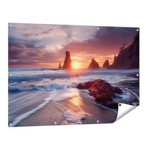 Tuinposter vooraanzicht De Zon gaat onder boven een Strand