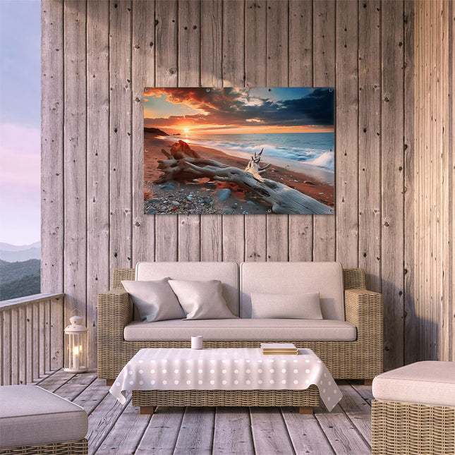 Tuinposter buiten terras Drijfhout op een Strand bij Zonsondergang