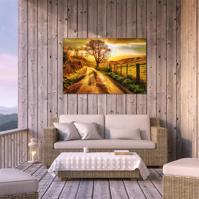 Tuinposter buiten terras Eenzame Boom in een Veld bij Zonsondergang