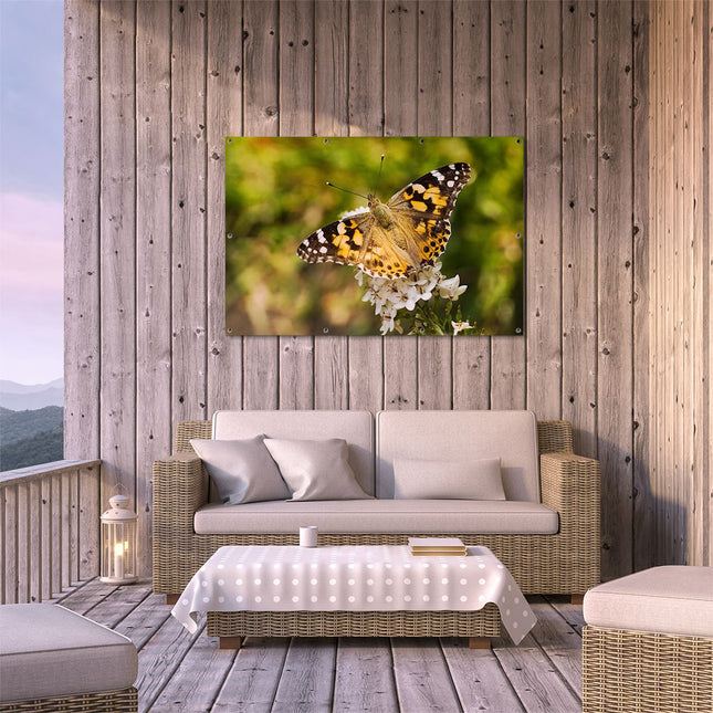 Tuinposter buiten terras Vlinder op Bloem