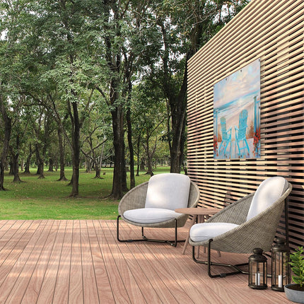 Tuinposter buiten Twee Adirondackstoelen op een Terras met Uitzicht op de Oceaan